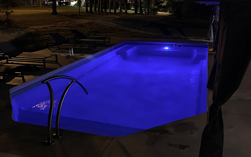 Alaglas Pools Bermuda fiberglass pool in quartz at night