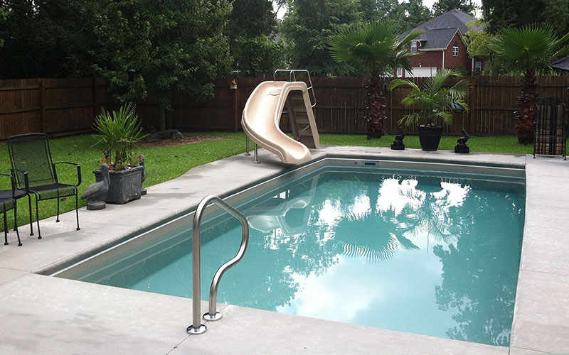 Alaglas Pools' Islander model, medium fiberglass pool in Topaz